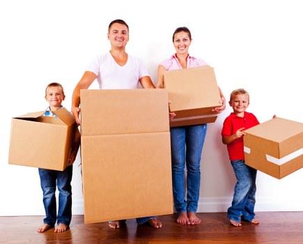 Moving van and packed boxes for a house removal