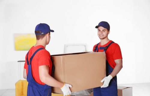 Local removal team planning a house move in a residential area