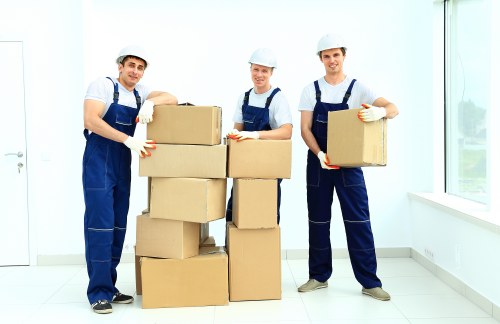 Moving van arriving at a home with careful loading support