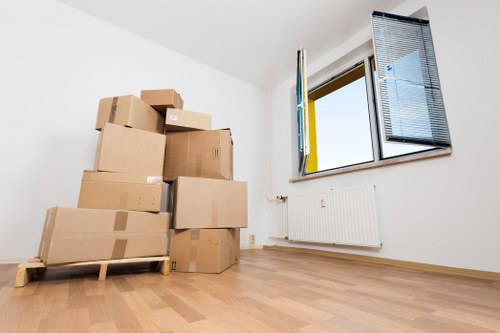 Professional movers handling access and stairway challenges in a house move