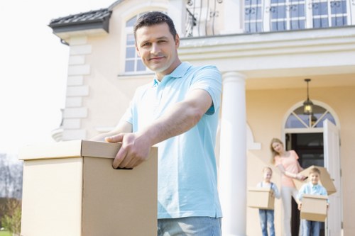 Organised house moving service handling boxed belongings and furniture