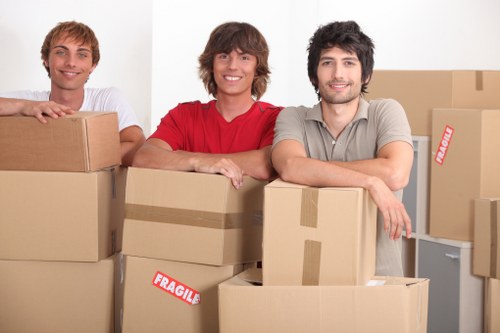 House moving van loading furniture for a residential relocation