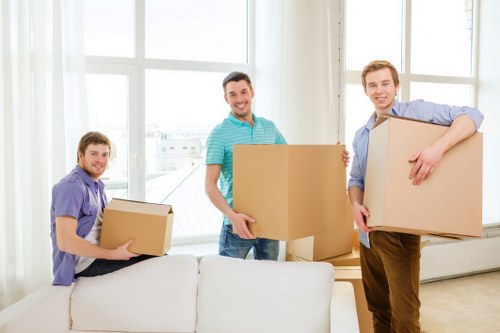 Household moving preparation with packed boxes and furniture