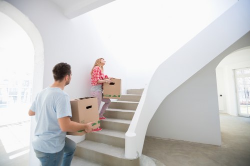 Supervisor reviewing safety procedures for a house removals job