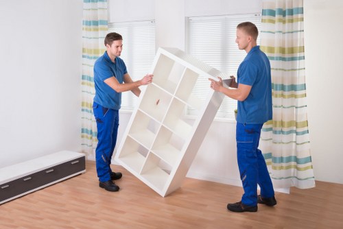 House movers loading boxes and furniture for transport